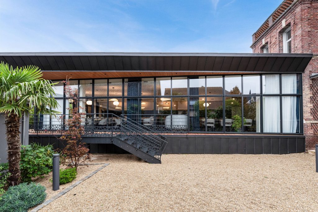 Photo d'un agrandissement de maison avec véranda à Rouen